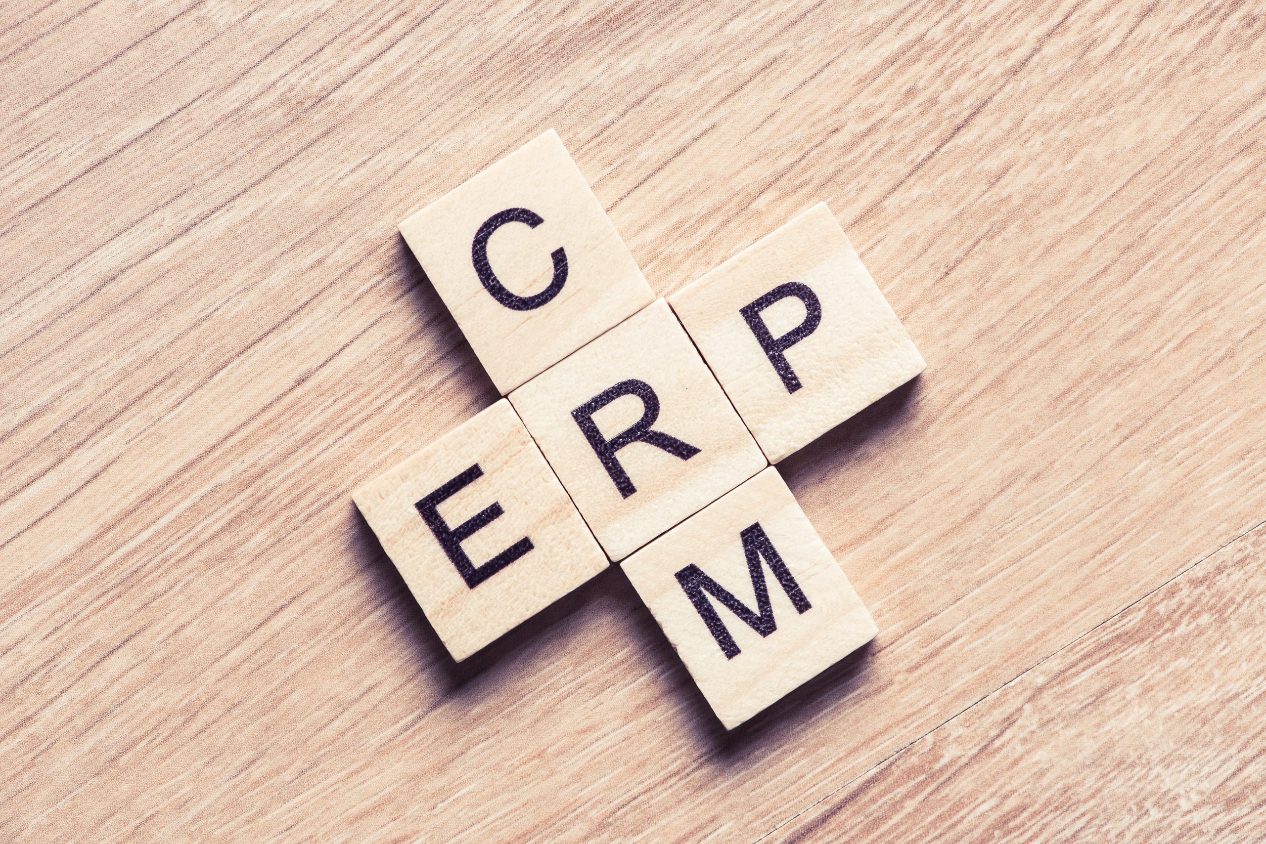 AdobeStock_162845398-min CRM and ERP