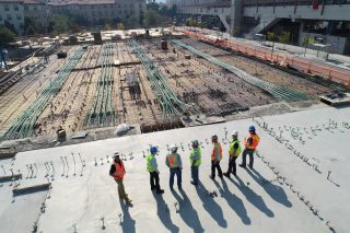construction Construction team discussing project plans on-site.