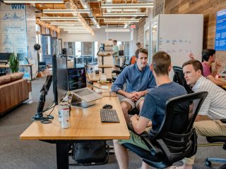 team meeting Professionals in a meeting, collaborating on strategy.